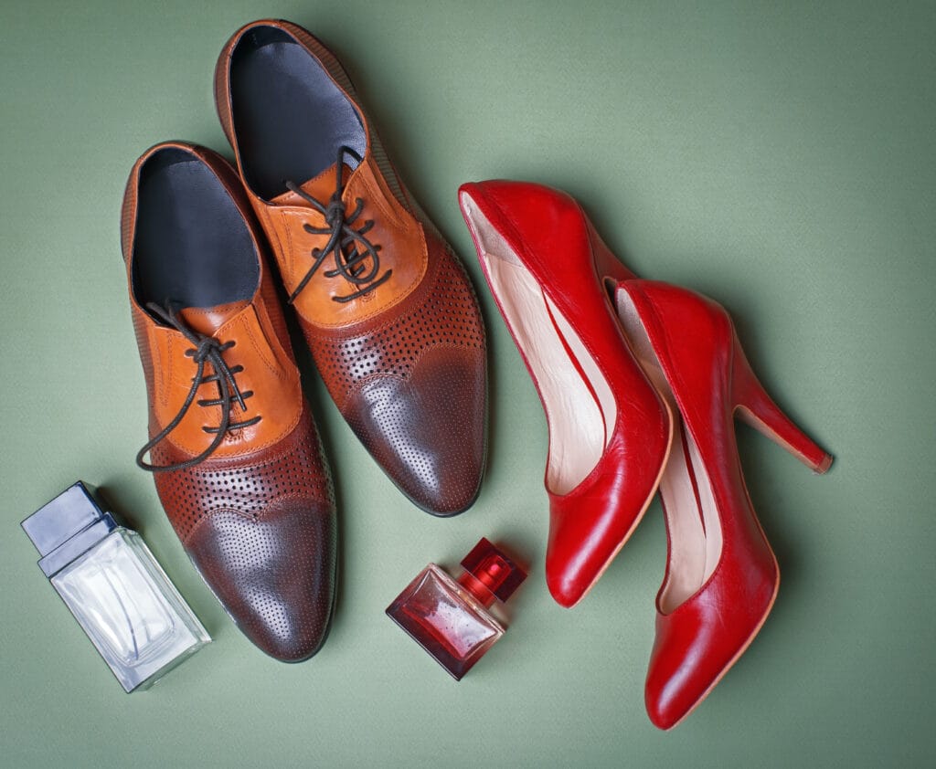 male and female shoes with a perfume