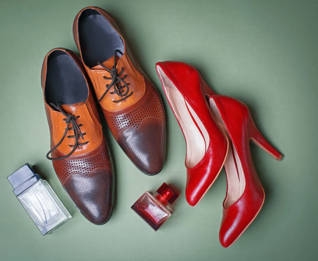 male and female shoes with a perfume